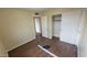 Bedroom with closet and wood look floors at 11602 W Sage Dr, Avondale, AZ 85392