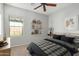 Bedroom featuring window with natural light and shelving with decor at 1250 E Vermont Dr, Gilbert, AZ 85295