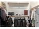 Walk-in closet with shelving and hanging rods for ample storage at 1250 E Vermont Dr, Gilbert, AZ 85295