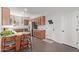 Spacious kitchen with a breakfast bar, granite countertops, and stainless steel appliances at 1250 E Vermont Dr, Gilbert, AZ 85295