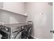 Modern laundry room with front-load washer and dryer set at 1250 E Vermont Dr, Gilbert, AZ 85295