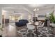 Open-concept living area with sight lines to the dining room, featuring modern furniture and decor at 1250 E Vermont Dr, Gilbert, AZ 85295