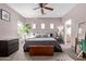 Comfortable main bedroom featuring neutral color walls, large windows and a ceiling fan at 1250 E Vermont Dr, Gilbert, AZ 85295