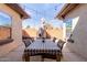 Outdoor patio with large table, seating, and string lights ideal for entertaining at 1250 E Vermont Dr, Gilbert, AZ 85295