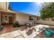 This home has a welcoming patio with a dining set and access to the house at 12633 W Brandywine Dr, Sun City West, AZ 85375
