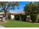 This home has great curb appeal with beautiful landscaping and a well-manicured lawn at 12633 W Brandywine Dr, Sun City West, AZ 85375