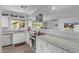 Modern kitchen with stainless steel appliances, granite countertops, and ample cabinet space for storage at 12633 W Brandywine Dr, Sun City West, AZ 85375
