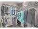 Spacious walk-in closet with ample hanging space and shelving for optimal organization at 12633 W Brandywine Dr, Sun City West, AZ 85375