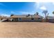 Back exterior view of home with spacious backyard at 1318 E Mission Grande Ave, Casa Grande, AZ 85122