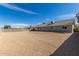 Back exterior view of home with spacious backyard and patio at 1318 E Mission Grande Ave, Casa Grande, AZ 85122