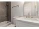 This bathroom has a quartz countertop, new fixtures, and a shower/tub combo at 1318 E Mission Grande Ave, Casa Grande, AZ 85122