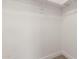 This closet has a shelf with a metal rod for hanging clothes at 1318 E Mission Grande Ave, Casa Grande, AZ 85122