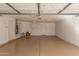 Spacious two car garage featuring epoxy floors and plenty of storage space at 1318 E Mission Grande Ave, Casa Grande, AZ 85122