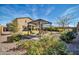Landscaped backyard with a charming gazebo seating area at 13307 W Paso Trl, Peoria, AZ 85383