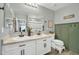 Stylish bathroom with a double sink vanity, modern fixtures, and charming decorative elements at 13307 W Paso Trl, Peoria, AZ 85383