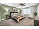 Bedroom featuring carpet, neutral tones, and a ceiling fan at 13307 W Paso Trl, Peoria, AZ 85383