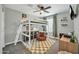 Fun bedroom with a loft bed, a comfortable beanbag chair, and a dedicated study area at 13307 W Paso Trl, Peoria, AZ 85383