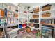 Spacious pantry with organized shelving and storage, featuring a beverage cooler at 13307 W Paso Trl, Peoria, AZ 85383