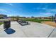 Community park featuring picnic tables, shade trees, green space, and a playground for residents at 13307 W Paso Trl, Peoria, AZ 85383