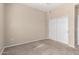 Bedroom featuring carpet, neutral paint and double door closet at 14575 W Mountain View Blvd # 11221, Surprise, AZ 85374