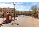 Gated entrance to Park Place Condominiums, with well-kept brick streets and community signage at 14575 W Mountain View Blvd # 11221, Surprise, AZ 85374