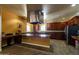 Chef's kitchen features a large center island, stainless steel appliances, and plenty of cabinet storage at 14575 W Mountain View Blvd # 11221, Surprise, AZ 85374