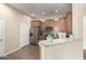 Kitchen with stainless steel appliances, granite countertops, and modern cabinetry to create an updated feel at 14575 W Mountain View Blvd # 11221, Surprise, AZ 85374