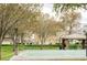 Basketball court with mature trees and a covered picnic area at 1531 S Owl Dr, Gilbert, AZ 85296