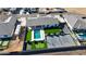 Exceptional backyard featuring a refreshing pool, putting green, and tennis court for active recreation at 16832 E Hazeltine Way, Queen Creek, AZ 85142