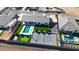 Exceptional backyard featuring a refreshing pool, putting green, and tennis court for active recreation at 16832 E Hazeltine Way, Queen Creek, AZ 85142