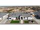 Charming single-Gathering home with a modern design, manicured lawn, and beautiful landscaping at 16832 E Hazeltine Way, Queen Creek, AZ 85142