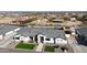 Charming single-Gathering home with a modern design, manicured lawn, and beautiful landscaping at 16832 E Hazeltine Way, Queen Creek, AZ 85142