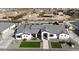 Charming single-Gathering home with a modern design, manicured lawn, and beautiful landscaping at 16832 E Hazeltine Way, Queen Creek, AZ 85142