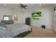 Bedroom with a neutral color scheme, carpeted floors, a ceiling fan, and an ensuite bathroom at 16832 E Hazeltine Way, Queen Creek, AZ 85142