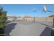 This is an outdoor sport court designed for playing pickleball and basketball at 16832 E Hazeltine Way, Queen Creek, AZ 85142