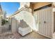 Inviting entryway featuring a security gate and a well-maintained walkway leading to the front door at 17132 N Silver Path, Surprise, AZ 85374