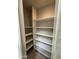 Functional pantry area featuring multiple shelving for optimal storage solutions at 17132 N Silver Path, Surprise, AZ 85374