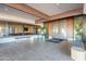 Welcoming lobby area featuring tile flooring, wooden beams and comfortable bench seating at 18716 E White Wing Dr, Rio Verde, AZ 85263