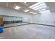 Bright dance studio with a wall mirror, barre, and hardwood floors at 18716 E White Wing Dr, Rio Verde, AZ 85263