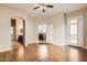 Open floor plan with hardwood floors, archway, and multiple entryways leading to other rooms at 19226 N Cave Creek Rd # 109, Phoenix, AZ 85024
