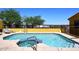Refreshing community pool featuring a relaxing spa and lounge chairs at 19226 N Cave Creek Rd # 109, Phoenix, AZ 85024
