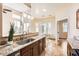 Modern kitchen featuring granite countertops and stainless steel appliances at 19226 N Cave Creek Rd # 109, Phoenix, AZ 85024