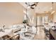 Stylish living room with tiled floors, high ceilings, and a large window at 19226 N Cave Creek Rd # 109, Phoenix, AZ 85024