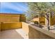 Private rooftop deck with stucco walls overlooking the community at 19226 N Cave Creek Rd # 109, Phoenix, AZ 85024