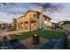 Lovely backyard featuring a fire pit, patio and mountain views at 19240 N 90Th Pl, Scottsdale, AZ 85255