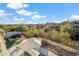 View of the backyard featuring artificial turf, seating, and lush landscaping at 19240 N 90Th Pl, Scottsdale, AZ 85255