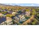 Scenic aerial view of a charming desert community with mountain views on a sunny day at 19240 N 90Th Pl, Scottsdale, AZ 85255