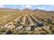 Panoramic aerial view of a thriving desert community with mountain views on a clear day at 19240 N 90Th Pl, Scottsdale, AZ 85255