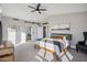 Bright main bedroom featuring a barn door and neutral decor at 19240 N 90Th Pl, Scottsdale, AZ 85255