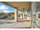 Covered patio area with ample space for outdoor dining and relaxation at 19240 N 90Th Pl, Scottsdale, AZ 85255
